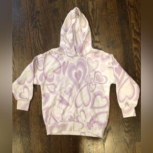 Primark - Girl’s hoodie features a purple heart pattern